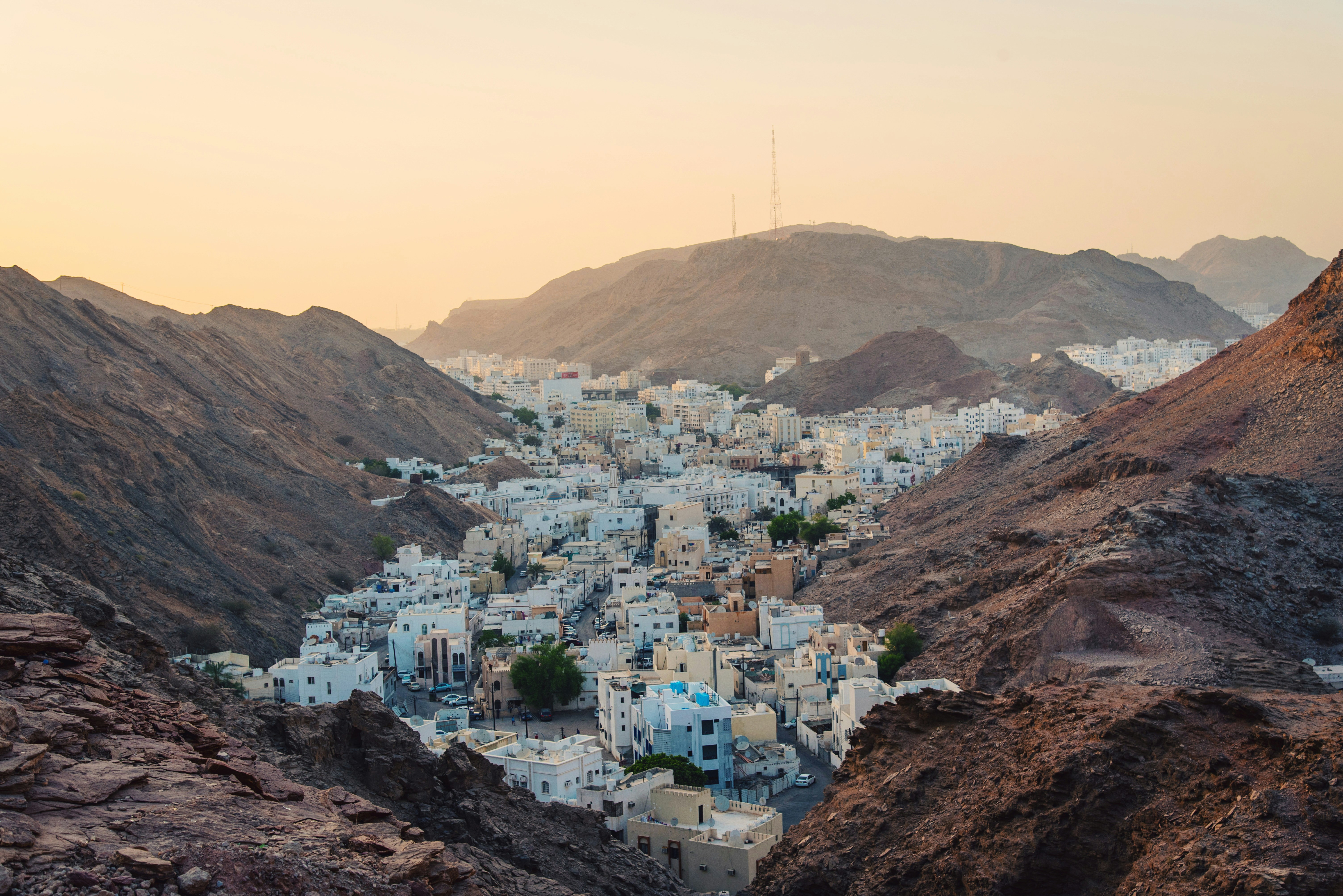 Wahiba Sands golden desert dunes Oman camel trekking